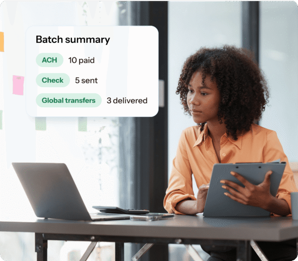A financial leader reviewing her batch summary with Traild